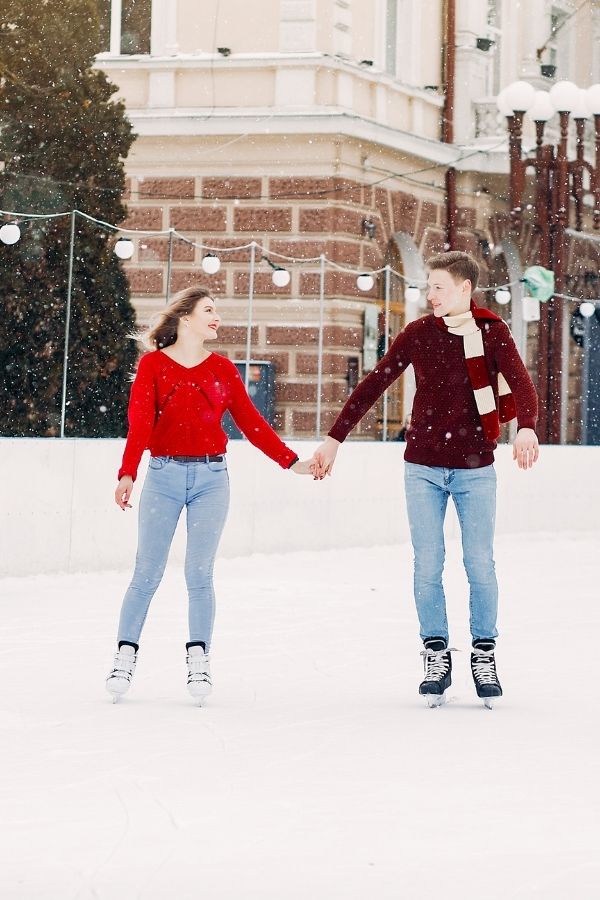 couple ice skating in the snow